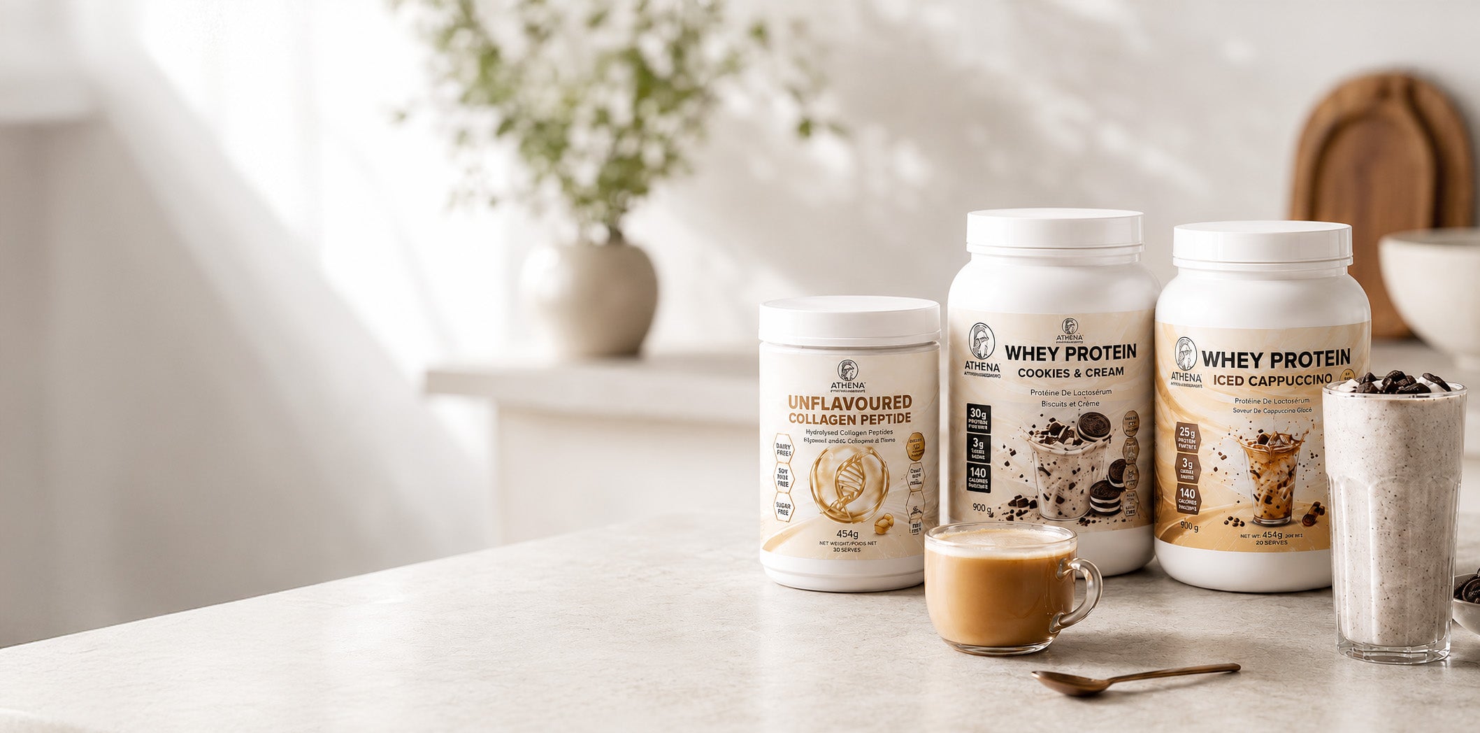 Athena collagen and protein products styled in a warm kitchen